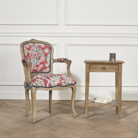 fauteuil de style avec tissu à motif de fleur stylisée